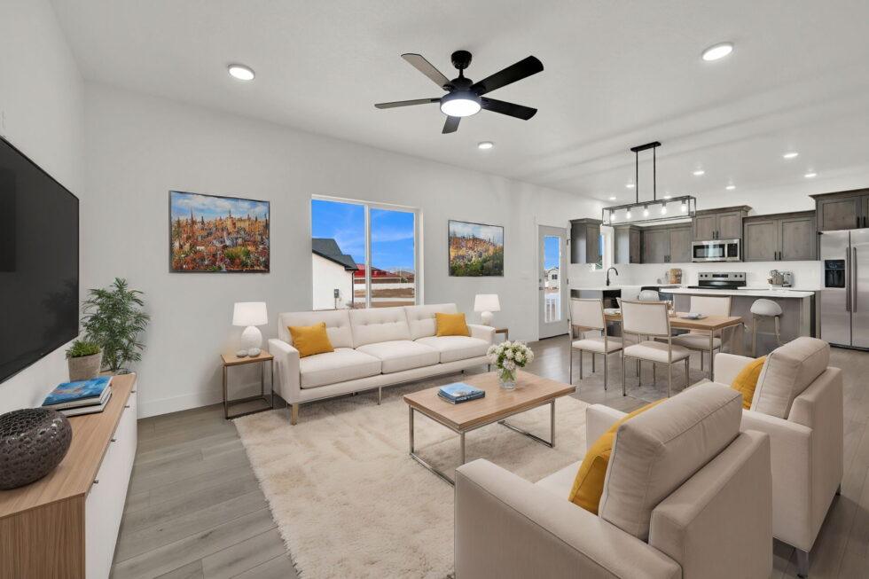 Open living and dining space with a kitchen featured by Steve Austin Homes