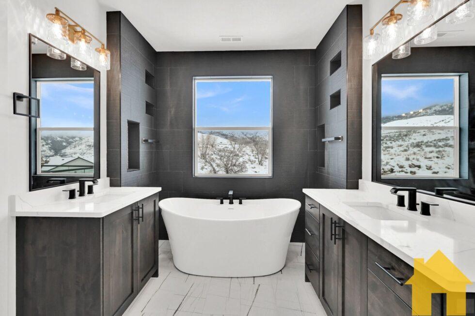 Wood vanities and tile details in a Steve Austin Homes bathroom project